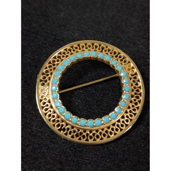 Vintage Blue Rhinestone Gold Tone Open Metal Work Filigree Round Brooch - Picture 3 of 6